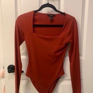 Forever 21 Orange body suit.